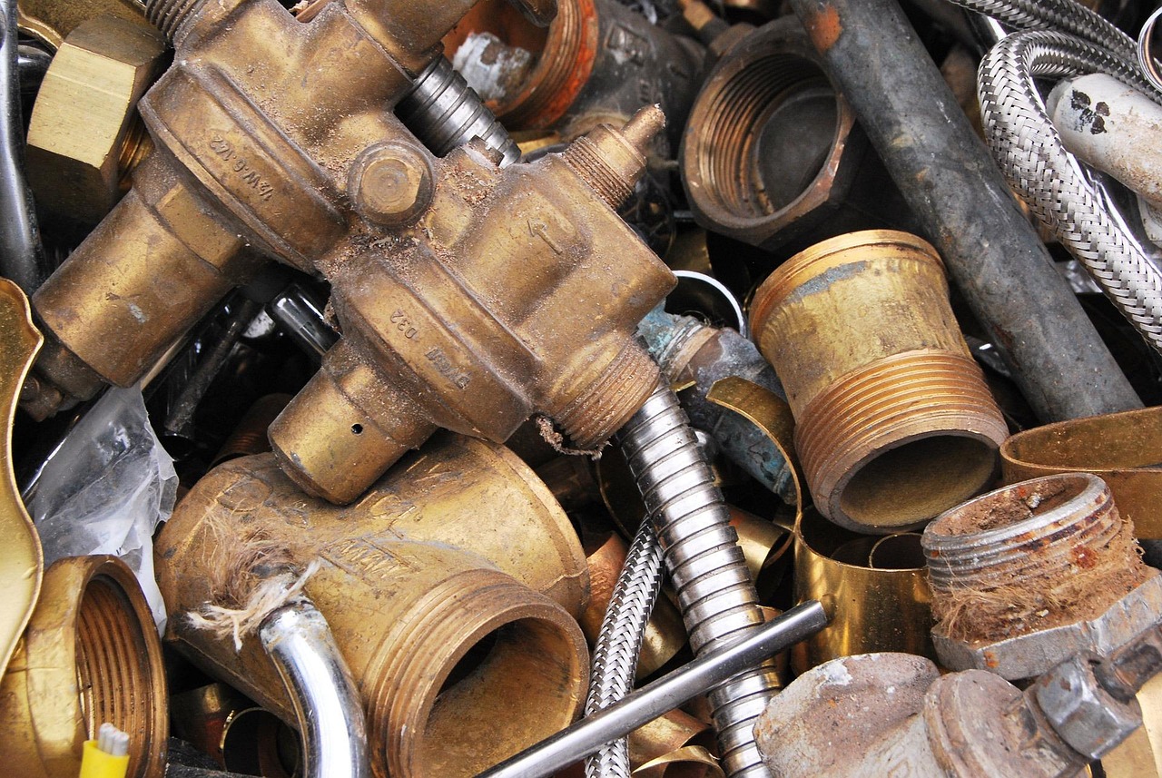 Yellow brass fittings and valves sorted for recycling