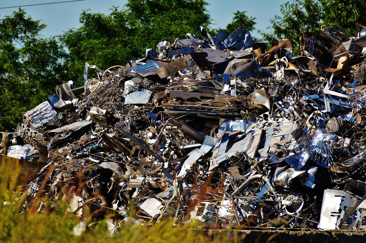 A pile of mixed scrap metal in a yard