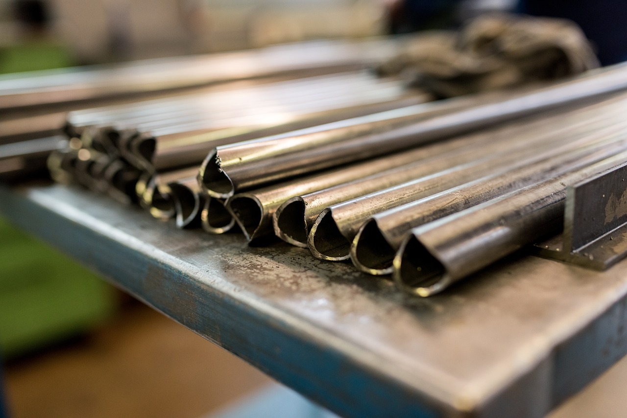 Cut stainless steel tube ends on a shop bench